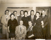 The Tackett clan front row: Noah and Maymie Tackett scond row: Marie Tackett Shawver, Pauline Tackett Cassidy, Mollie Tackett Cooper third row: Donald , Noah Leon, Frank, Estill, Arthur Tackett.