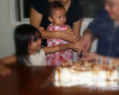 Zaria cutting the cake