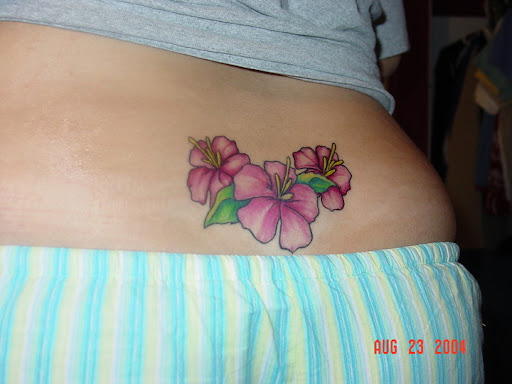 Back flower tattoos for girls