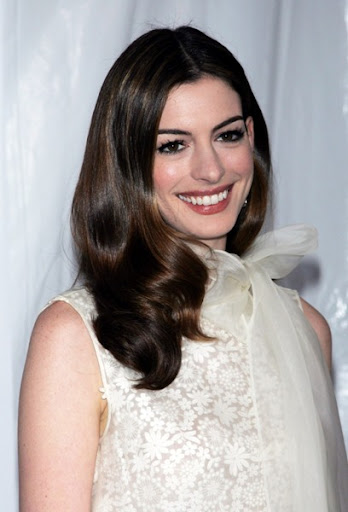 Anne Hathaway ; Awe Polished Wavy Hairstyle