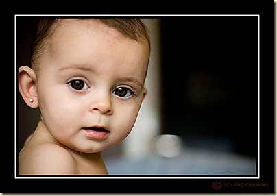 naked bebe looking at camera BORDER