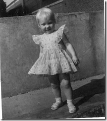 At dad's truck terminal in my dress made by Grandma