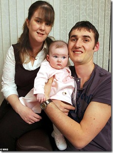 Picture of Julia Gregg and Krenar Lleshi with their daughter Hattie