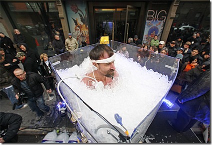 wim hof standing engulfed in ice in new york