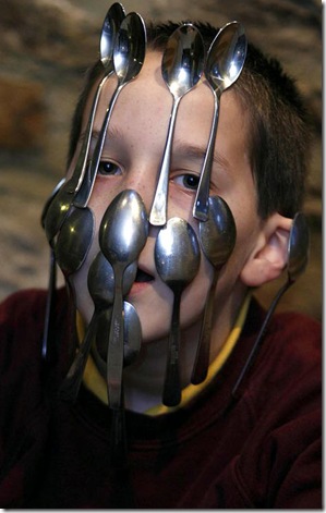 Joe Allison can hang 14 spoons on his face