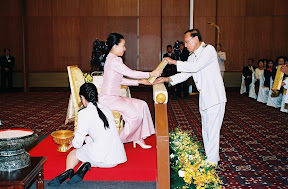 HRH presenting Tipitaka volume to Patrons of Dhamma Society to be handed over in India, Japan and Sweden, 2007 