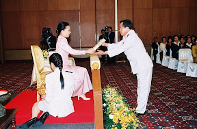 HRH presenting Tipitaka volume to Patrons of Dhamma Society to be handed over in India, Japan and Sweden, 2007 