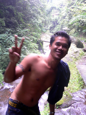My driver for the day, relaxing at Gitgit Waterfall