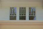 Handsome triplet of paned windows on older home in Jackson, MS. Photo by Lisa Callagher Onizuka