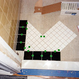 Starting the tile pattern - I had to start at the entrance, to make sure the pattern looks good when you first enter the room