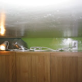 The outlet I added above the cabinets for the spotlights. I connected the outlet directly to the light switch below it.