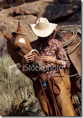 ist2_3001780_cowgirl_and_her_horse