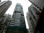Hong Kong is extremely dense, with lots of tall apartment buildings up into the hills. Hong Kong is extremely dense, with lots of tall apartment buildings up into the hills.