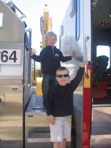 BigE with his buddy N on the fire truck