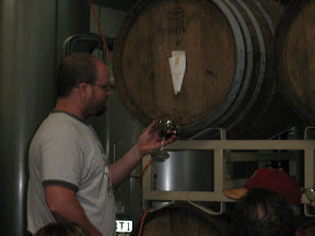 Tomme tapping a barrel with the best beer you'll never have