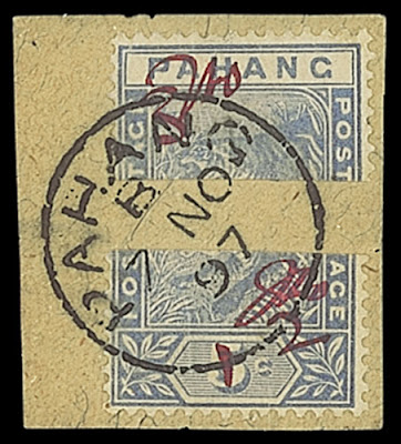 Dexu moitiés d'un timbre de Penang