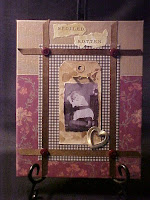 This piece is on 8"X10" canvas board backed with old dictionary pages.  You take one look at this little girl and know that she was loved.  I've used scrapbook papers, ribbons, acrylics, and old jewelry.  Thanks for looking!