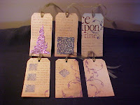 These tags are made from cardstock with a fantasy theme.  A little glitter has been added and each has a moss green ribbon.  Size is 5 1/4" X 2 5/8".  They are blank on the back.