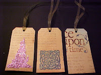 6 of 6 - These tags are made from cardstock with a fantasy theme.  A little glitter has been added and each has a moss green ribbon.  Size is 5 1/4" X 2 5/8".  They are blank on the back.