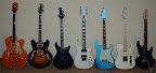 The non-PRS collection as of March 2008... Gretsch G6120-1959 hollowbody, Heritage H-535 semi-hollowbody, Voodoo Guitar Works custom archtop, Carvin DC120 12-string, G&L Legacy Standard, G&L ASAT Classic, EB MM John Petrucci 7-string 