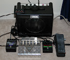 The “to go” rig... Top to bottom: Sabine STX-1100 tuner, Crate VC508 combo, Carl Martin compressor, Mesa/Boogie V-Twin preamp, Voodoo Labs Sparkle Drive, Dunlop Crybaby 535Q wah