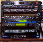 My first studio rack... Top to bottom: Rackrider RR-15+ power conditioner, (2) ART Tube Channel preamps, Rolls RM203 line mixer, Lexicon MPX-500 FX, dbx DDP compressor, Alesis M-EQ230 graphic EQ, Carvin HT150 power amp