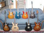 My PRS guitar collection as of Feb 2005... L to R back: various Custom 24’s; L to R front: Singlecut, McCarty Rosewood, McCarty Soapbar, Hollowbody II