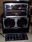 The “Big Rack” (main rig)... Top to bottom: RackRider power conditioner, Lexicon MPX-G2 FX, Mesa/Boogie Triaxis preamp, Mesa/Boogie SimulClass 2:90 power amp, Genz Benz G-Flex 2x12 cab, Lexicon MPX-R1 MIDI footcontroller