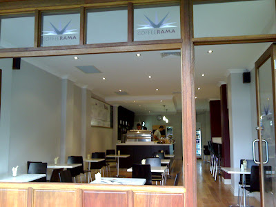 Cafe Interior with Minimalist Furniture and Wood Texture