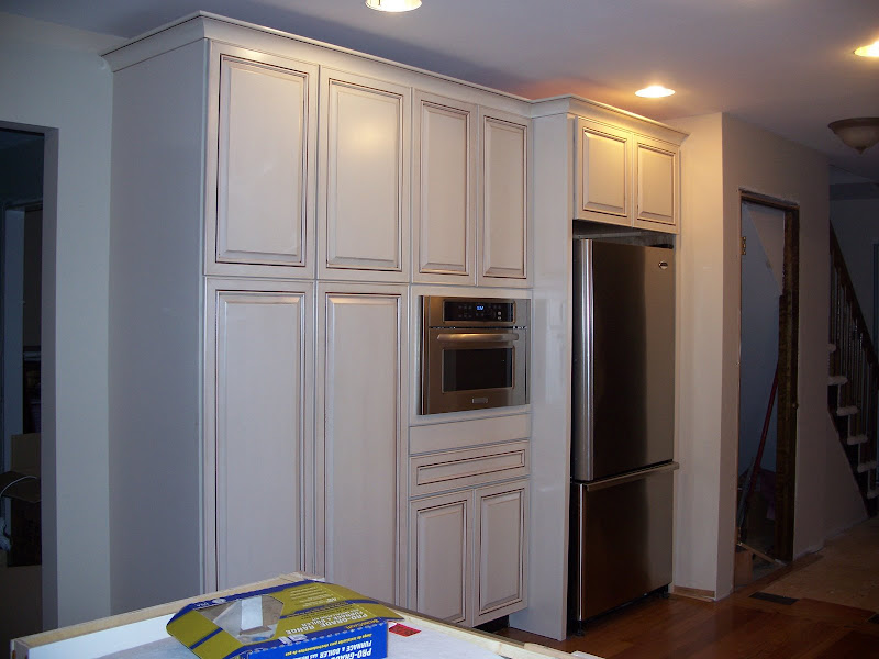 Can anyone show me creamy or ivory cabinets with glaze?