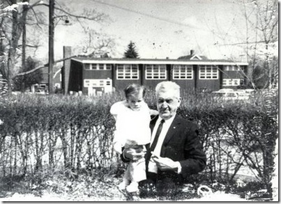 Andrew Bookless in the arm crook of his grandfather